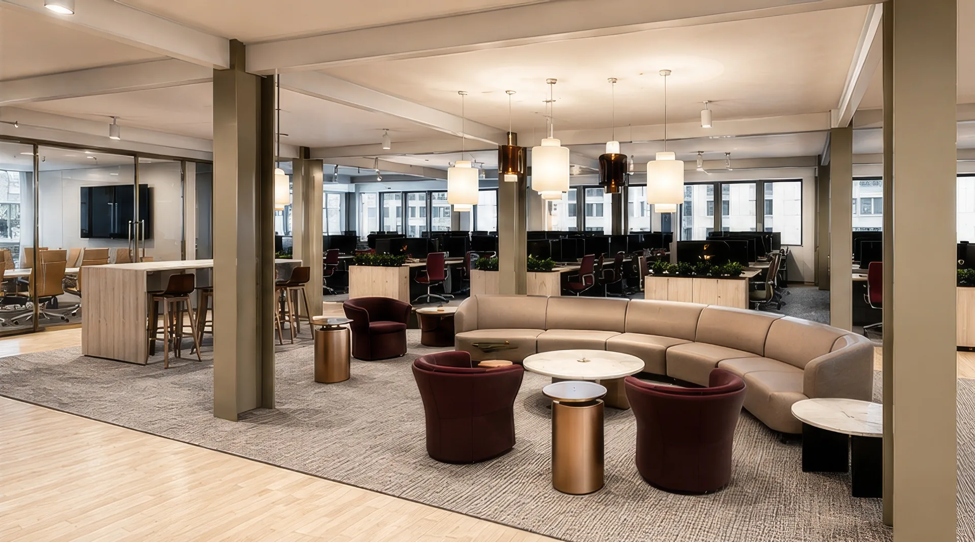 Lounge with curved seating adjoining open workstations